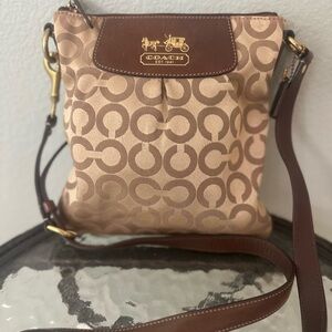 Coach Madison  tan and brown crossbody
 adjustable leather straps, pink lining
